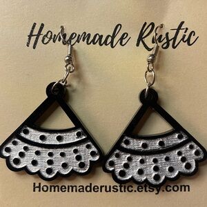 Wooden Ruth Bader Ginsburg inspired earrings.